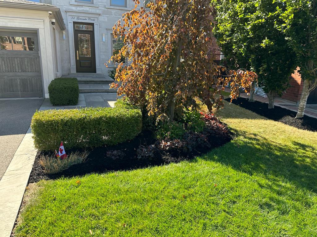 KCL Landscaping outdoor project with clean stone and lawn work